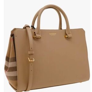 It’s a brand new classic Burberry Bag.